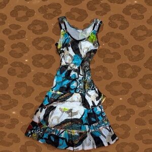 Vintage multi-coloured dress with a touch of blue, featuring a unique design